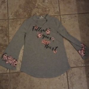 V-neck choker style shirt.